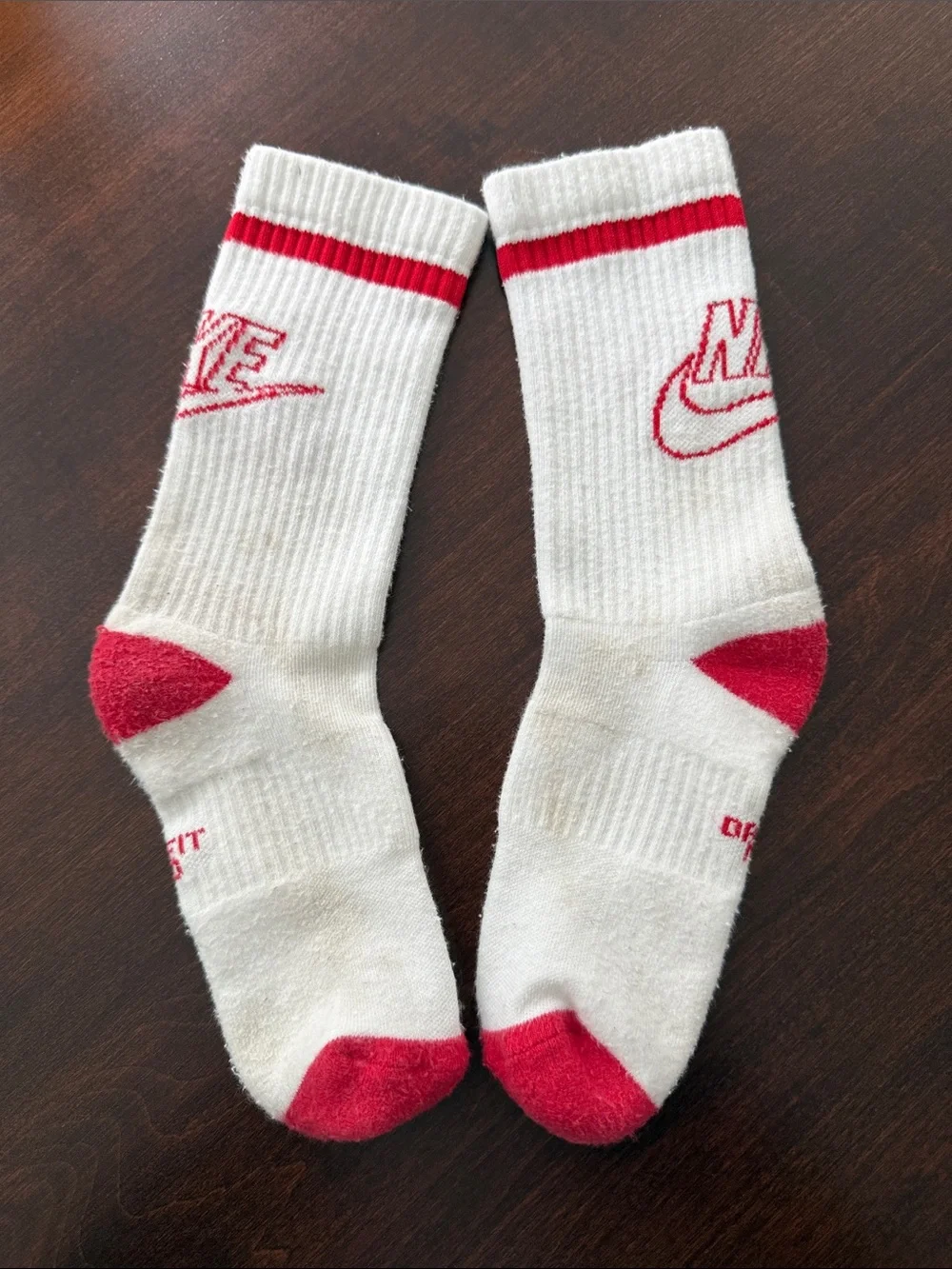 4 pairs Nike White Crew Athletic Socks with Red and Blue Accents heel to toe 8”.